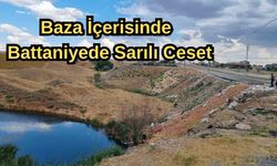 Baza içerisinde battaniyede sarılı ceset