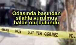 Odasında başından silahla vurulmuş halde ölü bulundu