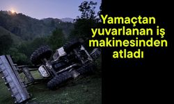 Yamaçtan yuvarlanan iş makinesinden atladı