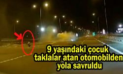 Taklalar atan otomobilden yola savruldu (Video)