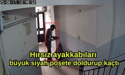 Hırsız ayakkabıları büyük siyah poşete doldurup kaçtı (Video)