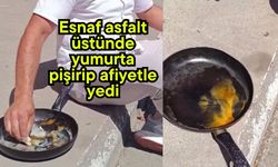 Esnaf asfalt üstünde yumurta pişirip afiyetle yedi (Video)