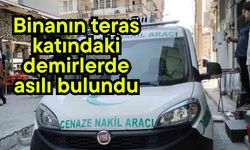 Binanın teras katındaki demirlerde asılı bulundu