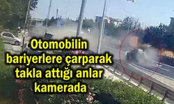 Otomobilin bariyerlere çarparak takla attığı anlar kamerada (Video)