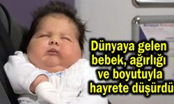 Ağırlığı  ve boyutuyla  hayrete düşüren bebek (Video)