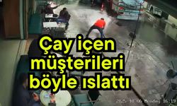 Çay içen müşterileri böyle ıslattı (Video)