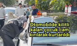 Otomobilde kilitli kalan çocuk cam kırılarak kurtarıldı (Video)