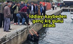 İddiayı kaybeden genç kış günü denize atladı