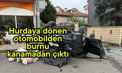 Hurdaya dönen otomobilden burnu kanamadan çıktı