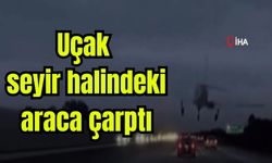 Uçak seyir halindeki araca çarptı (Tıkla İzle)