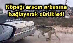 Köpeği aracın arkasına bağlayarak sürükledi
