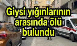Giysi yığınlarının arasında ölü bulundu