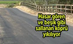 Hasar gören ve beşik gibi sallanan köprü yıkılıyor