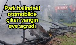 Park halindeki otomobilde çıkan yangın eve sıçradı