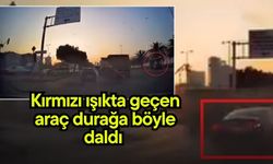 Kırmızı ışıkta geçen araç durağa böyle daldı (Video)