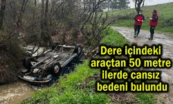 Dere içindeki araçtan 50 metre ilerde cansız bedeni bulundu