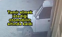 Tamir etmek istediği otomobilin altında kaldı