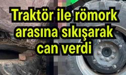 Traktör ile römork arasına sıkışarak can verdi