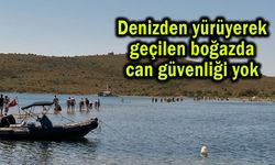 Denizden yürüyerek geçilen boğazda can güvenliği yok (Video)