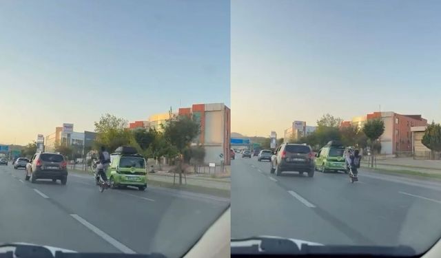 Trafikte motosikletiyle akrobasi yaptı (Video)