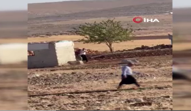 Aileler arasında silahlı çatışma (Video)