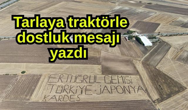 Tarlaya traktörle dostluk mesajı yazdı