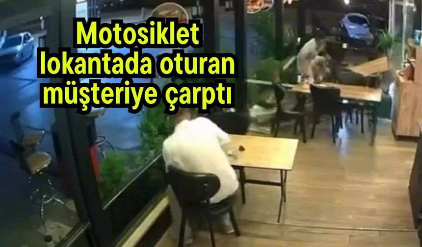 Motosiklet lokantada oturan müşteriye çarptı (Video)